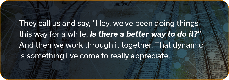 Text is overlayed on train tracks converging, suggesting decision-making and teamwork. Quote discusses collaboration and innovation with an appreciative tone.
